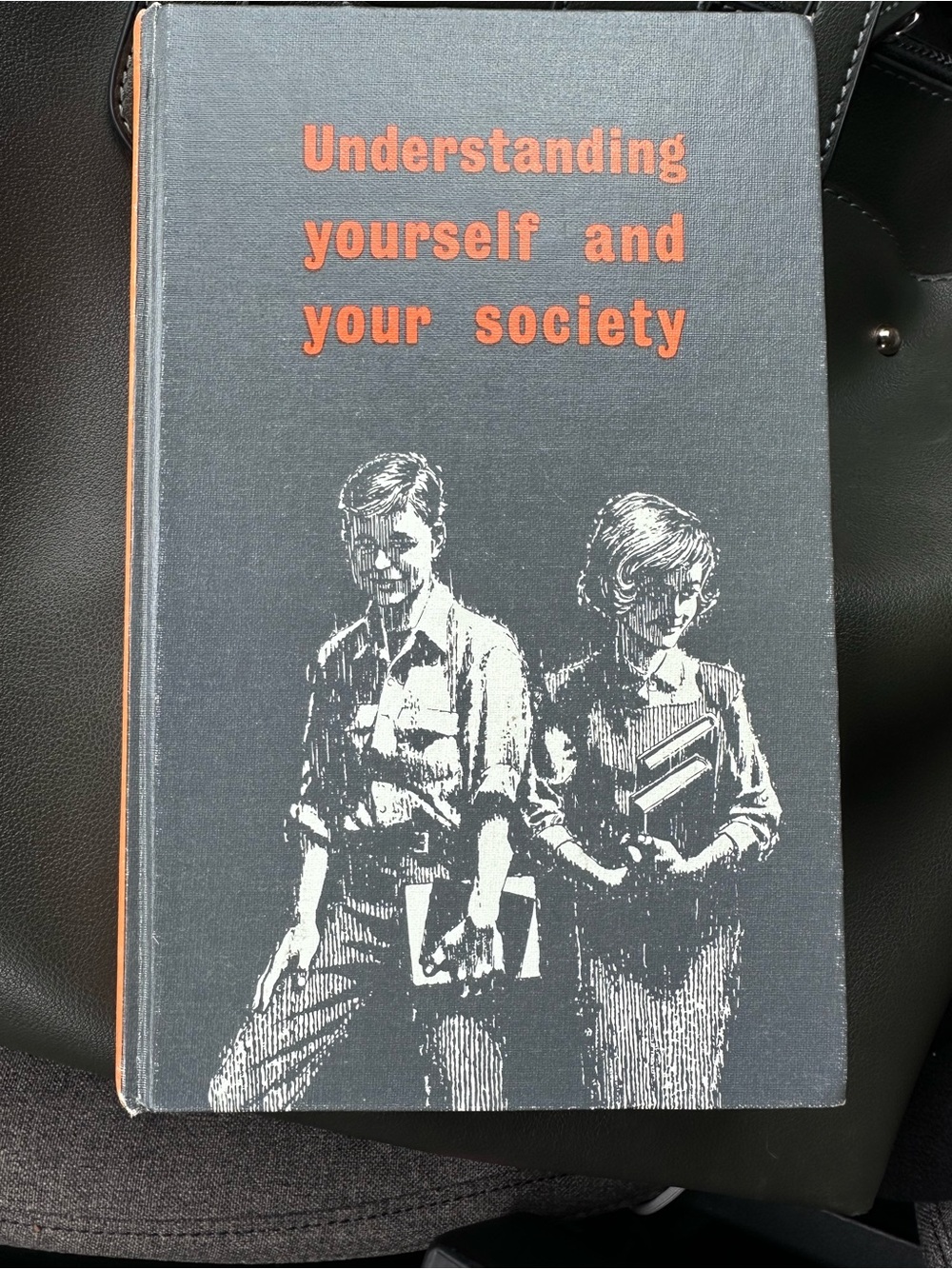 Understanding Yourself and Your Society Hardcover Book - Black & Orange